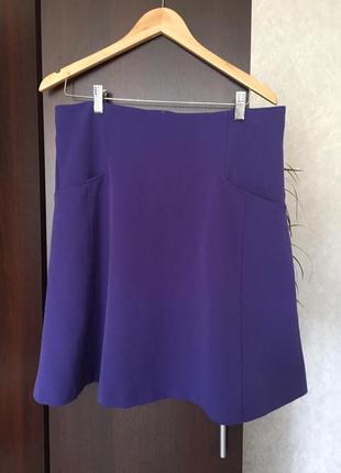 Расклешенная сиреневая юбка  с карманами2 фото