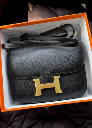 Кожаная женская брендовая сумочка в стиле hermes. цвет черный.