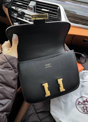 Кожаная женская брендовая сумочка в стиле hermes. цвет черный.2 фото