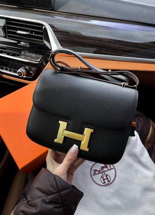 Кожаная женская брендовая сумочка в стиле hermes. цвет черный.3 фото