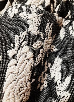 Evita англия красивая юбка деми/зима мини серо-белая в цветы в склады трикотажная на резинке женская7 фото