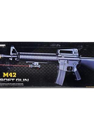 Автомат з пульками в коробці