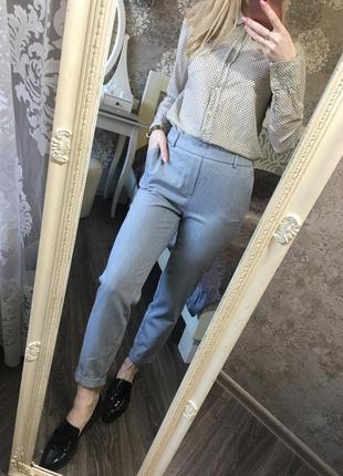 Стильные брючки с карманами