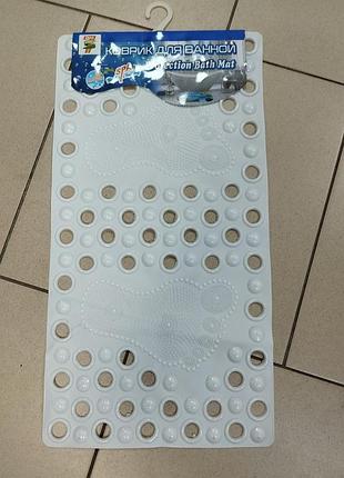 Килимок в ванну на присосках