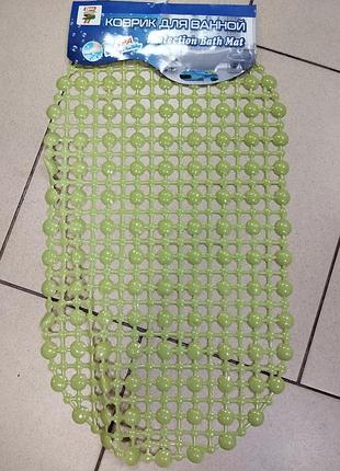 Килимок в ванну