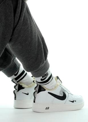 Зимние женские кроссовки nike air force 1 low white black (мех) 36-37-405 фото