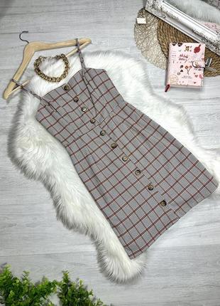 Стильний сарафан у клітинку на ґудзиках