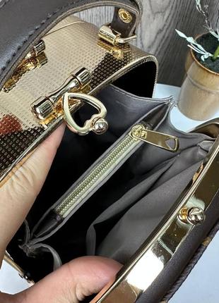 Жіноча міні сумочка рептилія каркасна із замочком 130910 фото