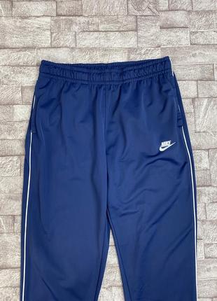 Спортивні штани nike swoosh l3 фото