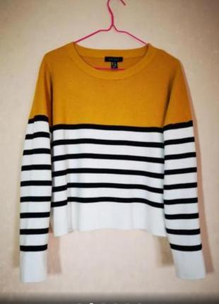 Шарний светр у чорну смужку