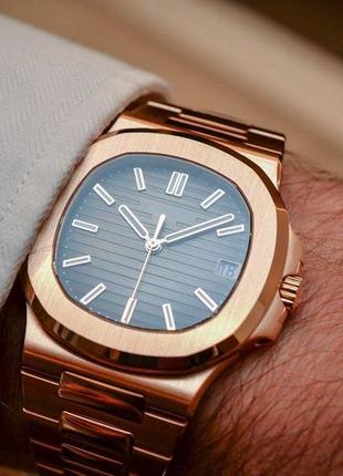 Patek philippe nautilus  годинник3 фото