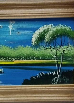 Картина маслом в дерев'яній рамці.