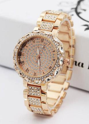 Жіночі наручні годинники з камінням рожеве золото