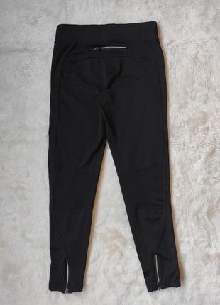 Чорні спортивні штани легінси спорт на флісі утеплені змійками знизу замочками кишенею3 фото