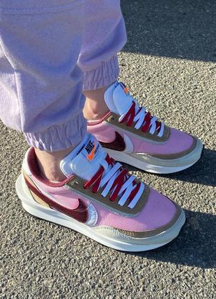 Жіночі рожеві кросівки nike розпродаж