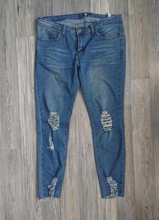 Женские джинсы с разрезами и необработанным краем р.44 /464 фото