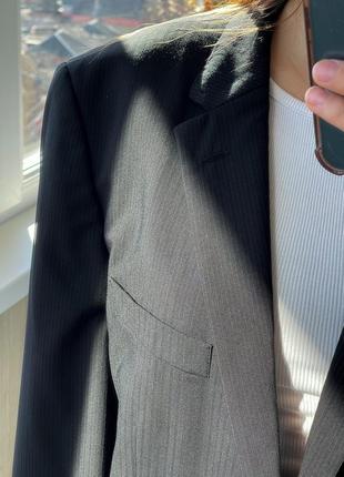 Черный удлиненный пиджак в полоску с шерстью с мужского плеча 1+1=37 фото