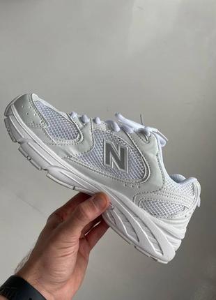 Женские белые кроссовки new balance4 фото