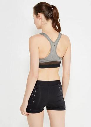 Топ спортивный nike pro classic swoosh3 фото