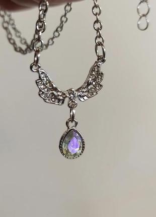 Подвеска крыла с камнем