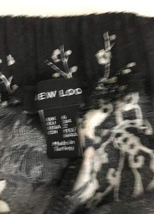 Широкие свободные брюки с цветочным принтом