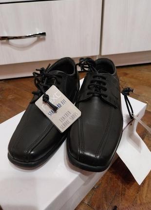 Чорні дитячі туфлі євро розмір121 фото