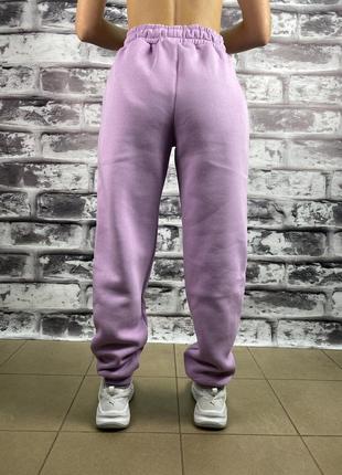 Теплые фиолетовые брюки с флисом3 фото