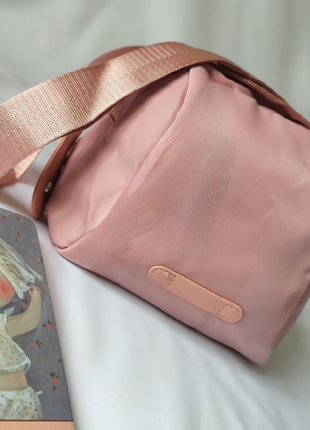 Розовая круглая сумочка кросс-боди7 фото