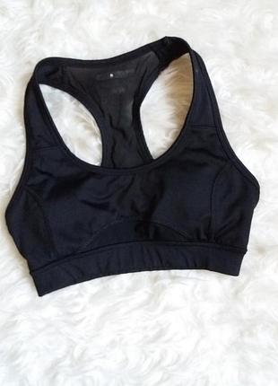 Топ зі вставкою із сітки на спині