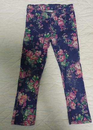 Джинсы/штаны для девочки  в цветочный принт c&a
