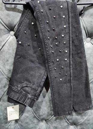 Джинсы в обтяжку