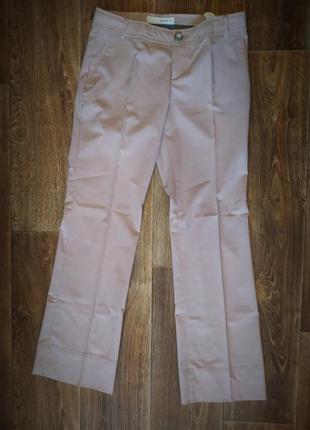 Розовые брюки