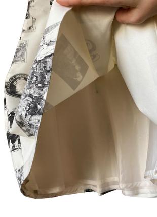Фирменная юбка от st-martins до колена а-силуэт, ткань с фотографиями и фото королевы3 фото
