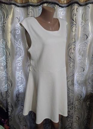 Дуже гарне плаття з фактурної тканини на пишні форми atmosphere2 фото