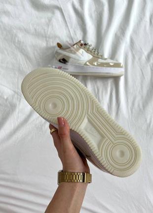 Жіночі кросівки nike air force 1 white beige3 фото