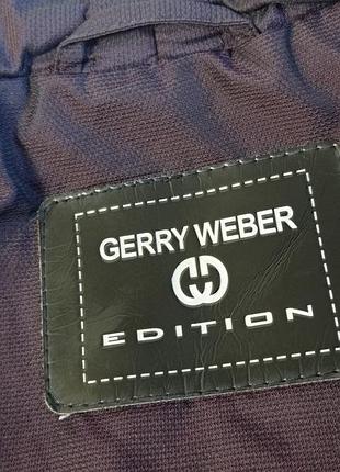 Брендовая теплая куртка,пуховик.