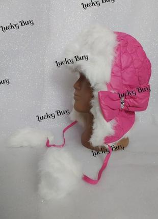 Розовая детская зимняя шапка с бантом.4 фото