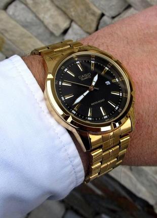 Золотые мужские наручные часы casio / касио5 фото