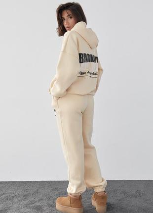 Утеплений спортивний костюм жіночий з джогерами та худі3 фото