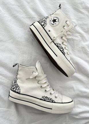 Високі білі кеди converse