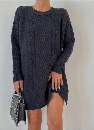 Теплая вязаная туника вязкая косичка оверсайз с разрезами свободного прямого кроя...