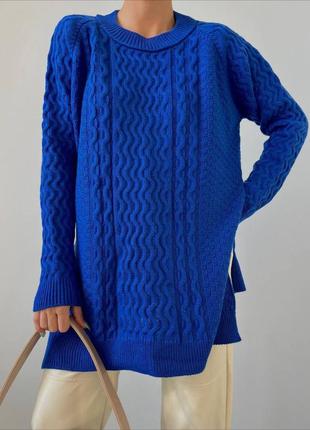 Теплая вязаная туника вязкая косичка оверсайз с разрезами свободного прямого кроя...