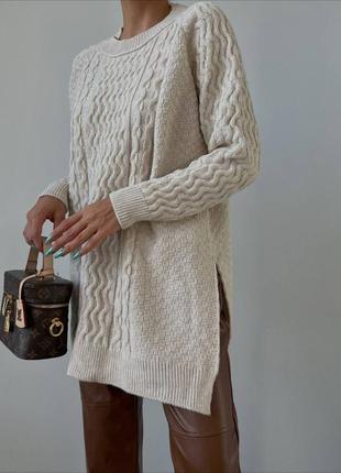 Теплая вязаная туника вязкая косичка оверсайз с разрезами свободного прямого кроя...