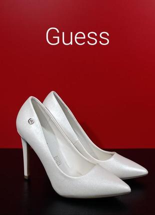 Жіночі білі туфлі guess1 фото