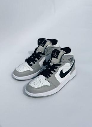 Високі зимові шкіряні кросівки на хутрі 
air jordan retro 1 black in gray