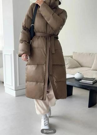 Теплая куртка пальто пуховик водостойкая плащевка на силиконе тепла с поясом карманами капюшоном свободного прямого кроя стеганая8 фото