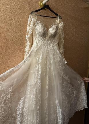 Весільна сукня з вишивкою ручної роботи3 фото