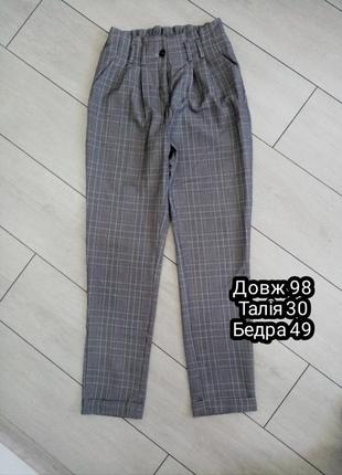 Штани класичні в клітку