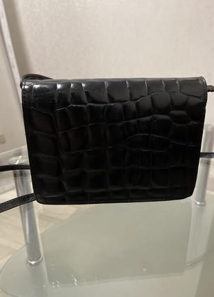 Шкіряна сумка темно коричневого кольору