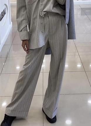 Брюки шерсть  loro piana lalelu в полоску палацо вільного крою з манжетом